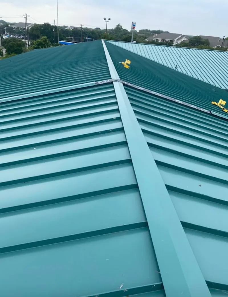 Green commercial metal roof ridge and valley for Metal Roof Repair in Town and Country